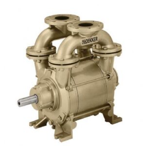 A brass-colored industrial vacuum pump with multiple curved pipes and flanges, a visible shaft, and the DEKKER logo on top.