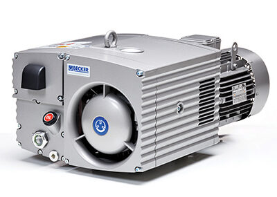 The Becker Pumps U 4.70 SA/K, now replaced by the U 5.71 model, is a silver industrial vacuum pump featuring a ribbed exterior, ventilation fan, attached motor, front-facing Becker logo, and various buttons and connectors.
