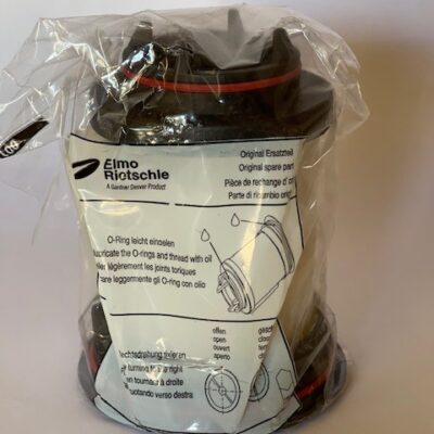 An Elmo Rietschle Exhaust Filter (P/N 731468) is sealed in clear plastic packaging, with visible instructions and diagrams on the front. The black and red filter component is partially obscured by the packaging.