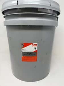 A large gray plastic bucket with a lid, labeled "Busch R580 Oil 5 Gallon Pail (P/N 0831.026.01)", featuring a red and white sticker on the front.