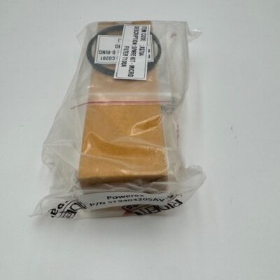 A Powerex Carbon Filter Element (P/N ST9404205AV), a gold-colored rectangular block, is wrapped in clear plastic with a white label and barcode on top, and placed on a white surface.