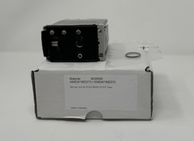 A Kaeser Eco Drain Service Kit 31/31F (P/N AN8247400370) rests on a white box labeled "Made in Germany." The box also holds a small circular ring and paperwork.