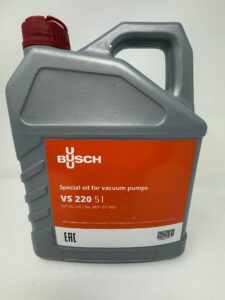 A gray plastic 5L container with a red cap and orange label reads "Busch VS 220 Oil 5 Liter (P/N 0831.217.853)." Product details are included, with "Made in Germany" embossed on the bottom.