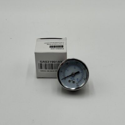 A Powerex, Inc. 2" Dryer Pressure Gauge (P/N GA031901AV) with a white dial and metal rim is shown in front of a small white box featuring barcodes and printed text, all set against a plain white background.