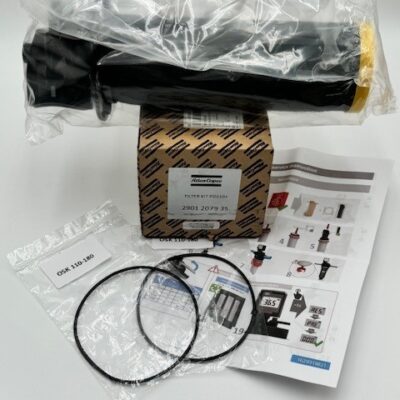 The Atlas Copco Filter Kit PD110+ (P/N 2901 2079 35) includes a black cylindrical filter, a barcode-labeled box, two O-rings, an instruction sheet with diagrams, and a plastic bag marked "O-RING 105-140," all on a white surface.