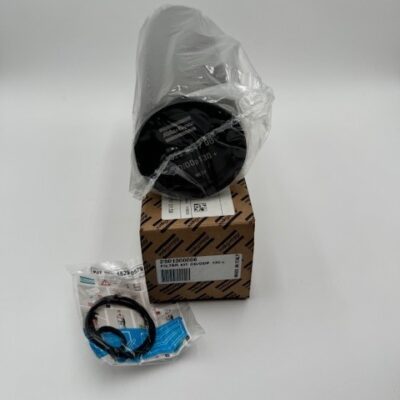 An Atlas Copco Filter Kit DD/DDP130+ (P/N 2901 3000 06) rests on a brown-striped box, partially wrapped in plastic. In front, a clear bag holds black O-rings and a blue gasket, all displayed against a plain white background.