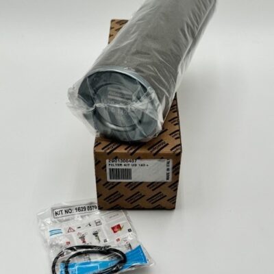 The Atlas Copco Filter Kit UD140+ (P/N 2901 3004 07) includes a large cylindrical filter wrapped in plastic, a box marked "PRINTER KIT 140," and a small bag with assorted parts and a black belt or cable, all on a white background.