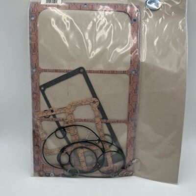 A labeled plastic bag contains assorted gaskets and seals—rectangular and circular in various sizes—for the Becker Pumps U4.165/4.190/4.250 Gasket Set (P/N 54900026400), with a barcode on the top left corner.