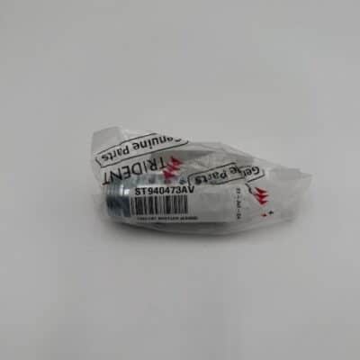 A Powerex, Inc. Muffler (P/N ST940473AV), cylindrical and small, is sealed in a clear plastic “Genuine Parts” bag and placed on a plain white surface.