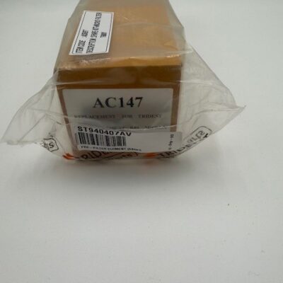 A rectangular brown package labeled "Powerex, Inc. Carbon Filter Element (P/N ST9404207AV)" sits on a white surface, partially wrapped in clear plastic.