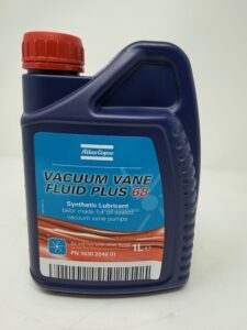 A 1-liter blue plastic container with red cap labeled "Dekker Vacuum Technologies Vacuum Vane Fluid Plus 68" (P/N 1630204801), a synthetic lubricant for oil-sealed vacuum vane pumps. Replaces Duratex 68CS P/N 5210-0002-002.