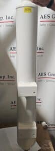 A Powerex, Inc. Desiccant Dryer Tank - Loaded (P/N SK108300AJ), a large white cylindrical unit with mounting brackets and a caution label on top, stands vertically before an AES Group, Inc. logo backdrop.