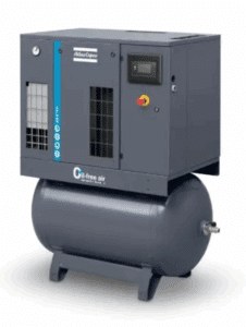 A gray Atlas Copco SF6+ air-cooled oil-free scroll air compressor with dryer, digital control panel, emergency stop button, and 72-gal tank labeled "Oil-free air" (P/N 8153613677).