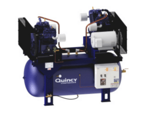 A large blue Quincy Compressor QT-10 Reciprocating Air Compressor with dual motors, mounted on a 120-gallon vertical tank, featuring control panels and copper piping.