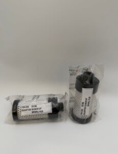 Two cylindrical filter components in plastic packaging, labeled “Trident Spare Kit Silencer Dryspell Plus 20 & 30 (P/N SK326A),” are pictured—one lying down and the other standing upright against a plain white background.