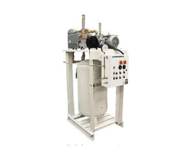 Powerex vertical air compressor system with a mounted control panel and pressure gauge.